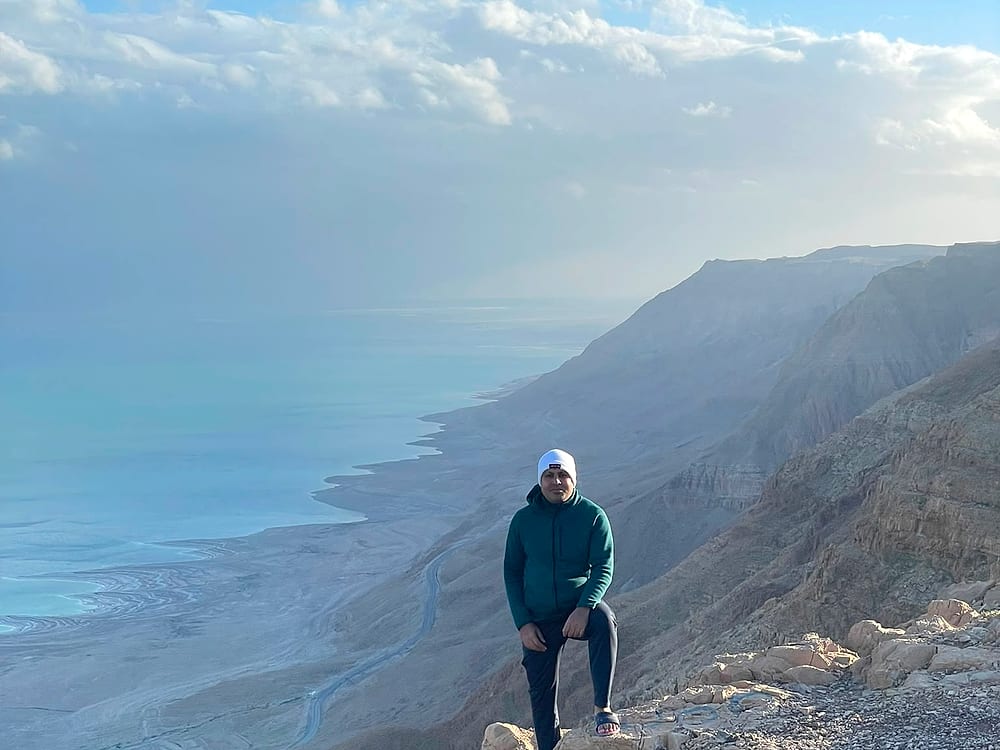 Standing on the escarpment above the Dead Sea, Israel